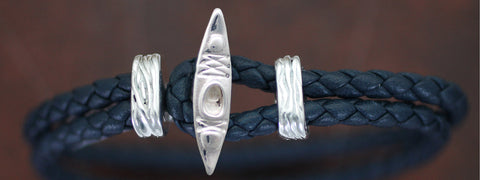 Sterling Silver Kayak with Braided Leather Bracelet